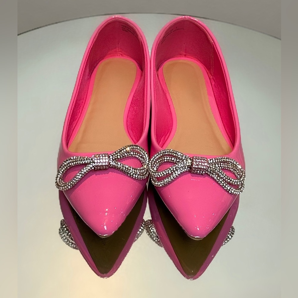 Pink and rhinestone flats